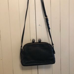 Cole Haan bag, in good condition, it’s a very dark navy blue, looks black